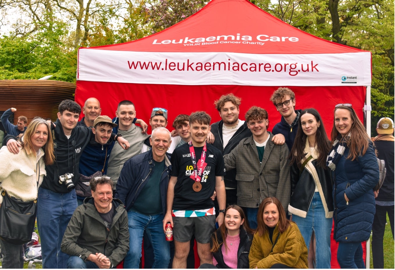 Image showing Leukaemia Care team and fundraiser at Leukaemia Care tent set up at London Marathon.