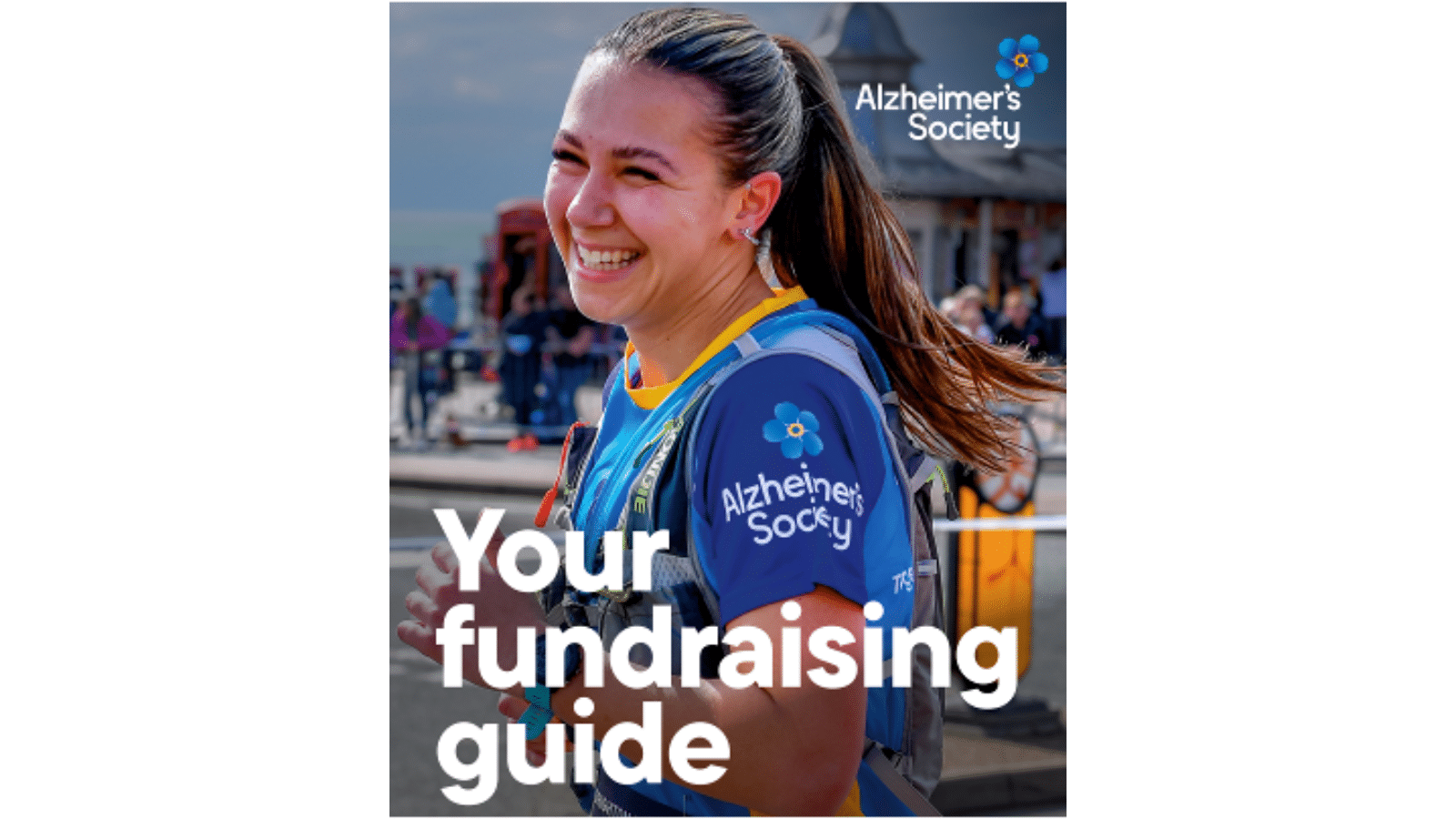 Image showing the cover of the fundraising guide Alzheimer's Research sends members of their fundraising team. The cover has an image of a runner, and reads "Your fundraising guide."