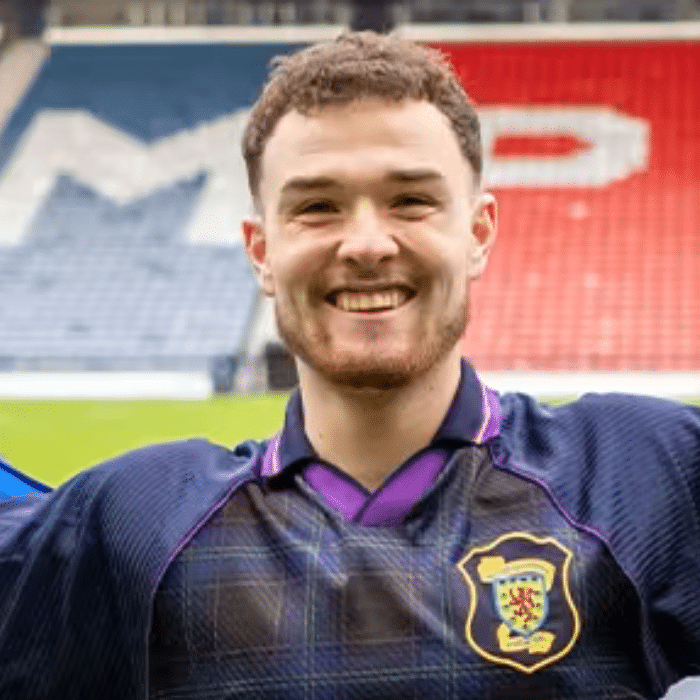 2026 JustGiving Awards finalist Craig Ferguson shown smiling on a football pitch